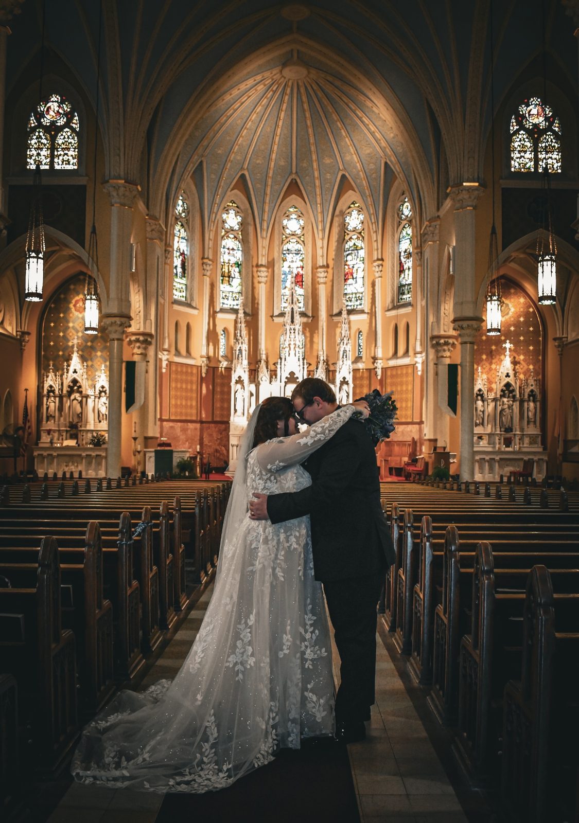 Wedding — First look in cathedral aisle